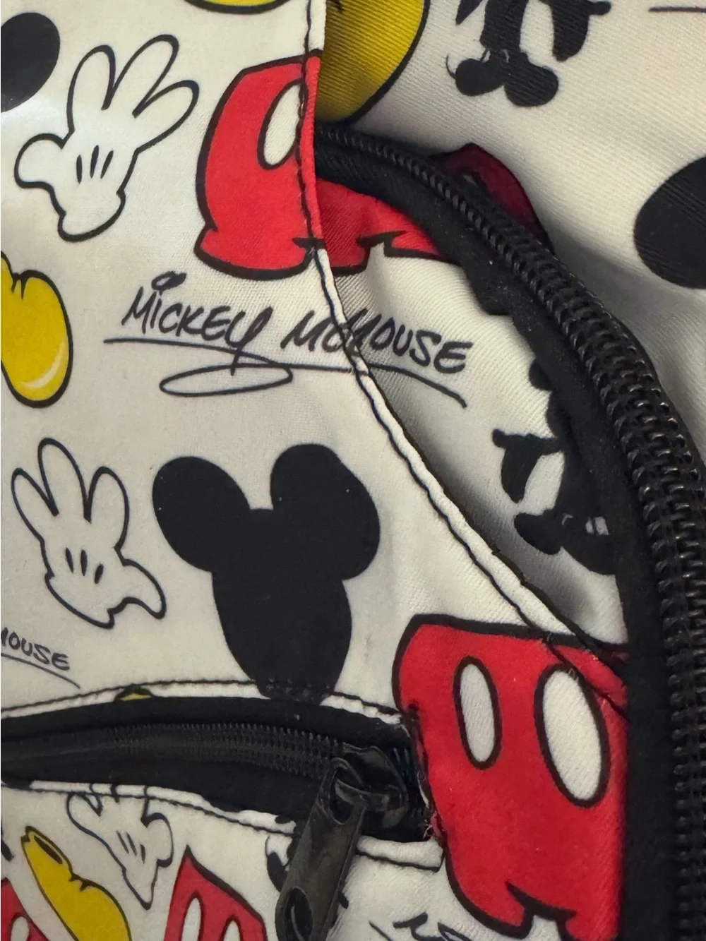 Disney White Sling Backpack with Red & Yellow Mickey Icons